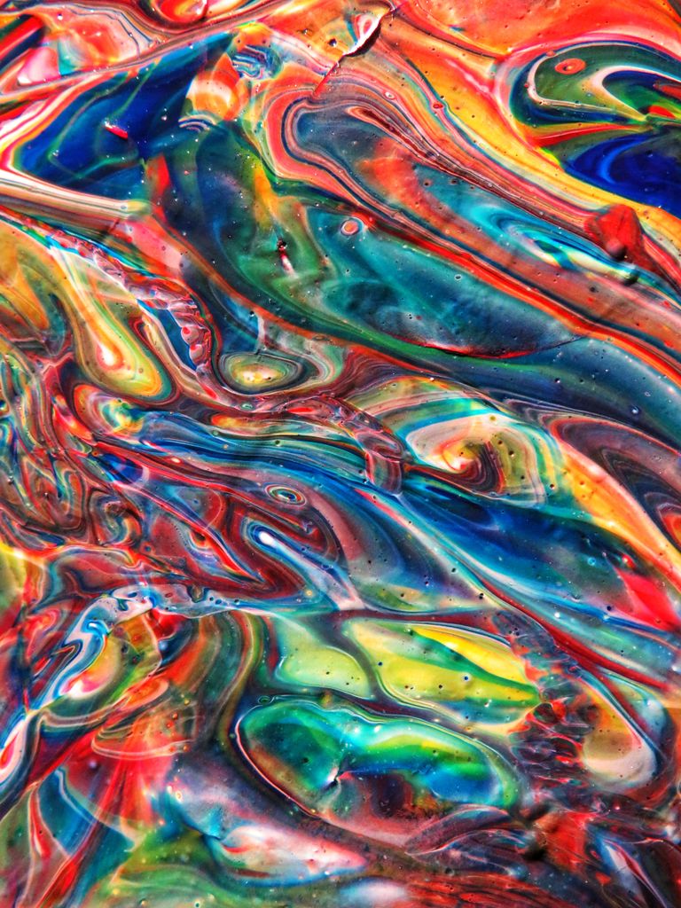 Dynamic abstract painting with vivid multicolor swirls and patterns, showcasing artistic creativity.